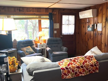 Wellfleet Cape Cod vacation rental - Living room with AC split and wood stove for cool nights