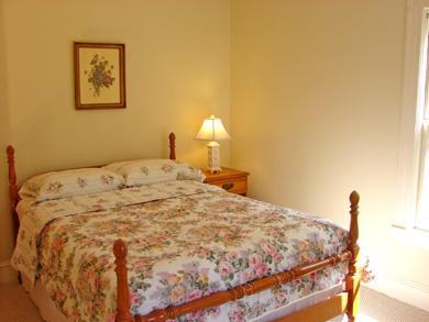 Dennis Cape Cod vacation rental - 3rd bedroom on main level. Upstairs loft has 4 more twins + 1 dbl