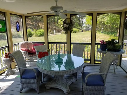 Wellfleet near Center Cape Cod vacation rental - Porch for dining and lounging on couch