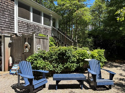 Brewster Cape Cod vacation rental - Outdoor shower and Adirondack chairs, lower driveway