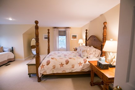 Brewster Cape Cod vacation rental - Family suite bedroom sleeps 5. Queen and 3 twins. View of pond.