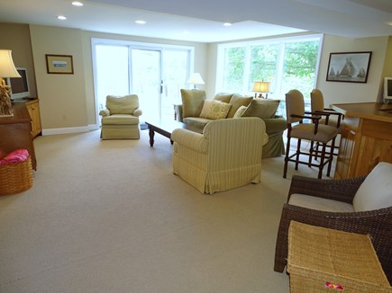 Brewster Cape Cod vacation rental - Lower level living area walk out to pond, outdoor shower, deck.