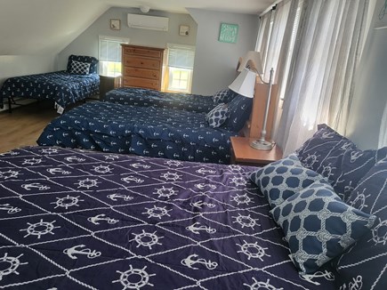 Dennis Port Cape Cod vacation rental - Upstairs bedroom with a Queen and 3 XL Twins - also a half bath