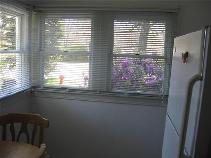 Hyannis Cape Cod vacation rental - kitchen with outside door & 5 windows for great air flow & VIEW