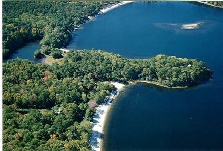 Ashumet Pond, Mashpee Cape Cod vacation rental - The cottage is the white roof at end of peninsula