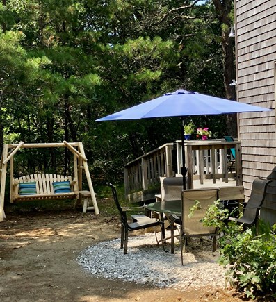 Wellfleet Cape Cod vacation rental - Side of house.  Additional eating area and swing.