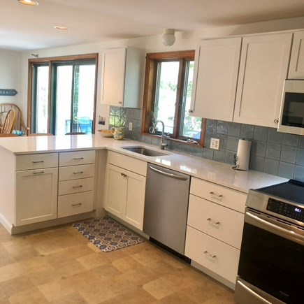 Wellfleet Cape Cod vacation rental - Renovated kitchen with induction stove, new microwave, dishwasher
