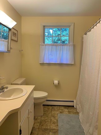 Orleans Cape Cod vacation rental - Second floor bathroom with tub and shower.