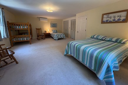 Orleans Cape Cod vacation rental - Large second floor bedroom- three twins and one full size bed.