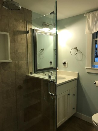 Orleans Cape Cod vacation rental - Custom glass shower and rainfall shower head in the bathroom.