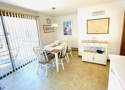 Harwich Cape Cod vacation rental - Large eat-in kitchen seats six with bench seating