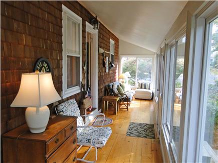 West Dennis Cape Cod vacation rental - Large sun porch w/ plenty of seating, overlooks conservation land