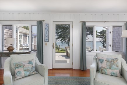 Orleans Cape Cod vacation rental - Living room looking across the deck to Pleasant Bay