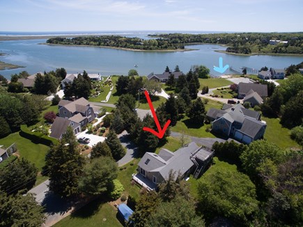 Eastham Cape Cod vacation rental - Aerial showing both units (red arrow) and beach (blue arrow)