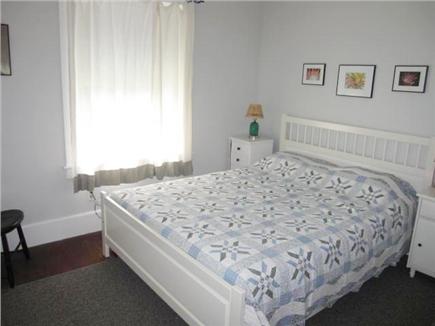 Woods Hole Cape Cod vacation rental - Downstairs bedroom with queen bed looks out on back yard.