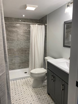 Brewster Historic District Cape Cod vacation rental - Bathroom marble and travertine tiles. Large shower for relaxation