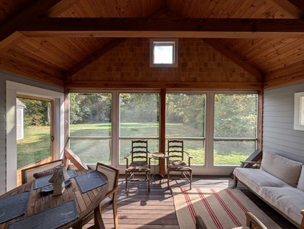Brewster Historic District Cape Cod vacation rental - Screen porch off living room looking to the private yard.