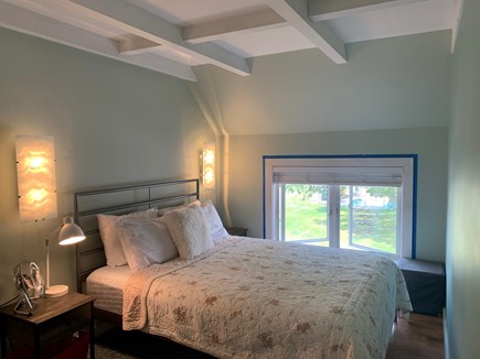 Harwichport Cape Cod vacation rental - Master bedroom w/queen bed & large breezy window.