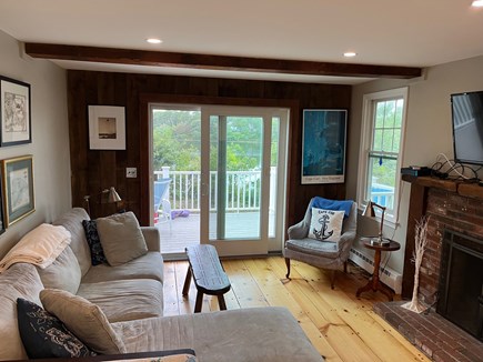 Brewster Cape Cod vacation rental - Cozy living room with TV and slider to pond front deck