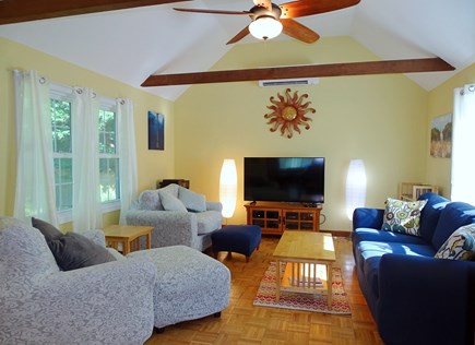 Chatham Cape Cod vacation rental - Great Room with TV, ceiling fan and vaulted ceiling