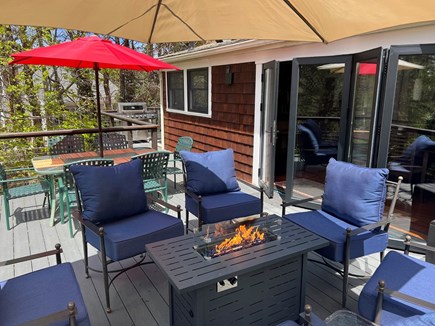 Brewster Dennis town line Cape Cod vacation rental - Large west facing deck with Fire Pit