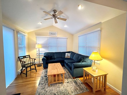 Popponesset Cape Cod vacation rental - Sunroom with slider to deck, outdoor shower and back yard