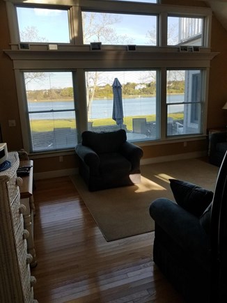 Eastham Cape Cod vacation rental - Living Room with 16FT of windows overlooking patio and water