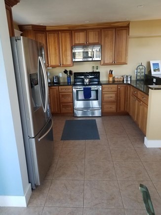 Town Cove In Eastham Cape Cod vacation rental - Working area of Kitchen D/W, Large Refrigerator, Stove, Microwave