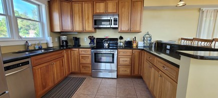 Eastham Cape Cod vacation rental - Natural cherry kitchen with S/S large refrigerator & appliances