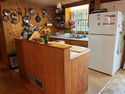 Orleans Cape Cod vacation rental - Well-equipped kitchen with easy access to gas grill on deck