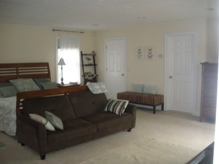 Falmouth Cape Cod vacation rental - Large Master Bedroom on first floor has sitting area and TV