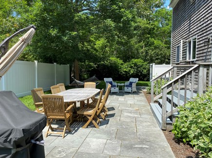 Eastham Cape Cod vacation rental - Bluestone patio with seating and outdoor shower