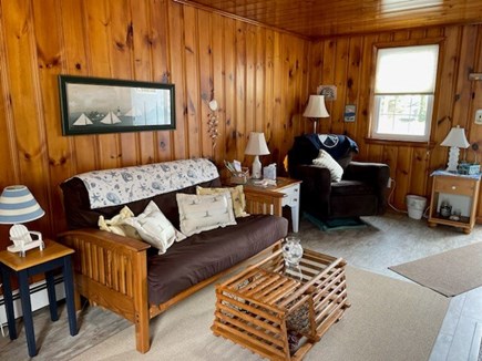 South Harwich Cape Cod vacation rental - Family room with fireplace adding to the Cape Cod charm