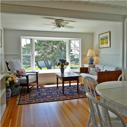 West Yarmouth Cape Cod vacation rental - The dining area opens onto another sitting area.