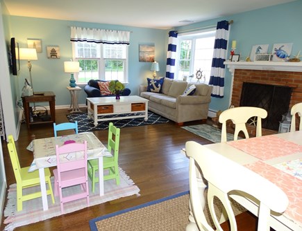 Brewster Cape Cod vacation rental - Family room and dining area with fireplace