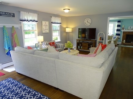 Brewster Cape Cod vacation rental - Living room offers flatscreen TV, large sectional