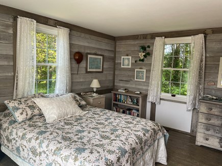 Orleans Cape Cod vacation rental - Primary BR has Queen bed, half bath & new slider to deck