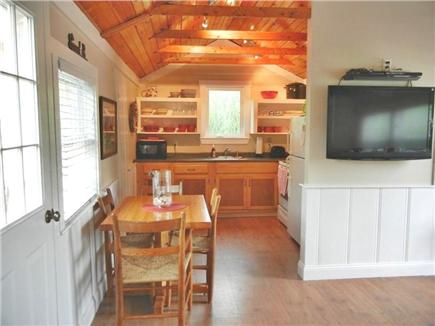 Wellfleet Cape Cod vacation rental - Dining area into kitchen ~ 40 inch LCD TV & DVD player