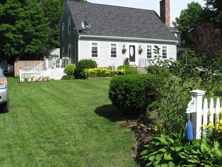 Bourne, Monument Beach Cape Cod vacation rental - Front lawn. Play Badminton and Cornhole
