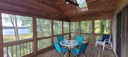 Orleans Cape Cod vacation rental - Screened in portion of upper deck, sliders to MBR