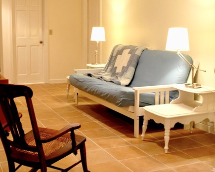 Orleans Cape Cod vacation rental - Lower common sitting area.  TV opposite fold-out futon couch.