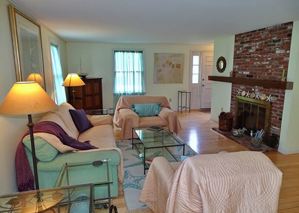 Chatham Cape Cod vacation rental - Spacious living room with fireplace and slider to back yard
