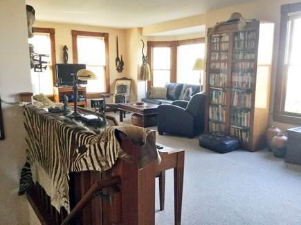 West Falmouth Cape Cod vacation rental - Family/TV room with large windows to water - African safari decor