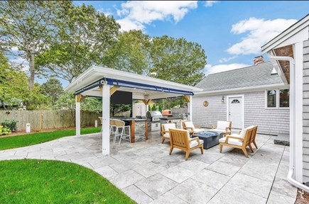 West Yarmouth Cape Cod vacation rental - Patio and pavilion over the outdoor kitchen