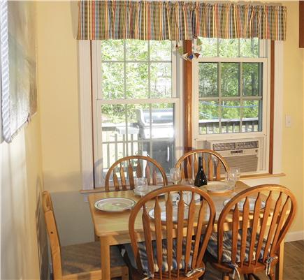 Eastham Cape Cod vacation rental - Kitchen overlooks deck and sunny back yard