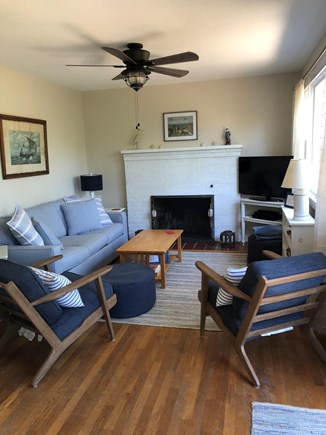 Wellfleet Cape Cod vacation rental - Living room with fireplace.