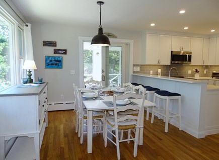 Wellfleet Cape Cod vacation rental - Dining area opens to kitchen and screened in porch