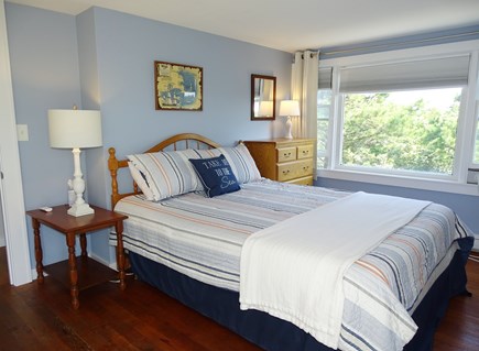 Wellfleet Cape Cod vacation rental - Upstairs queen bedroom with couch and access to upper deck
