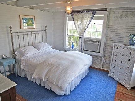 Brewster Cape Cod vacation rental - The first of five bedrooms is this tastefully appointed queen with water views on the main level.