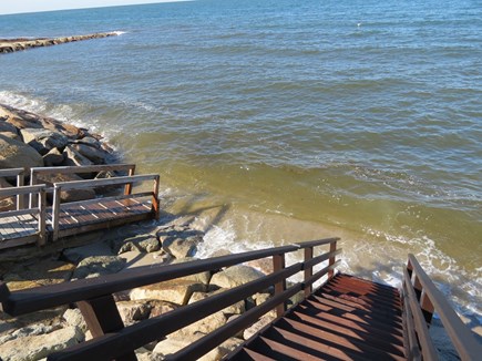 Brewster Cape Cod vacation rental - Extreme high tides can bring the water right up to the foot of the steps for an hour or two, but the rest of the time, the beach is there.